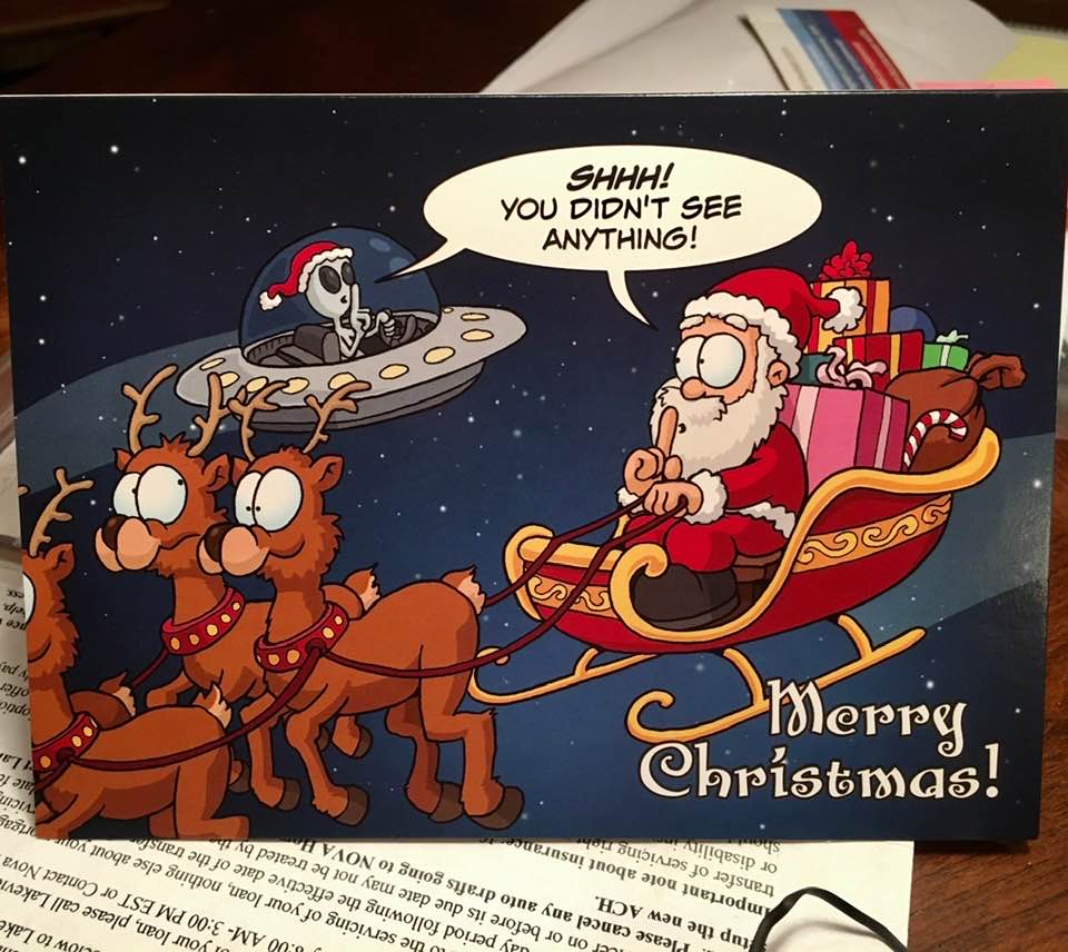 Cartoon Santa and alien in saucer 265720465_50573.jpg